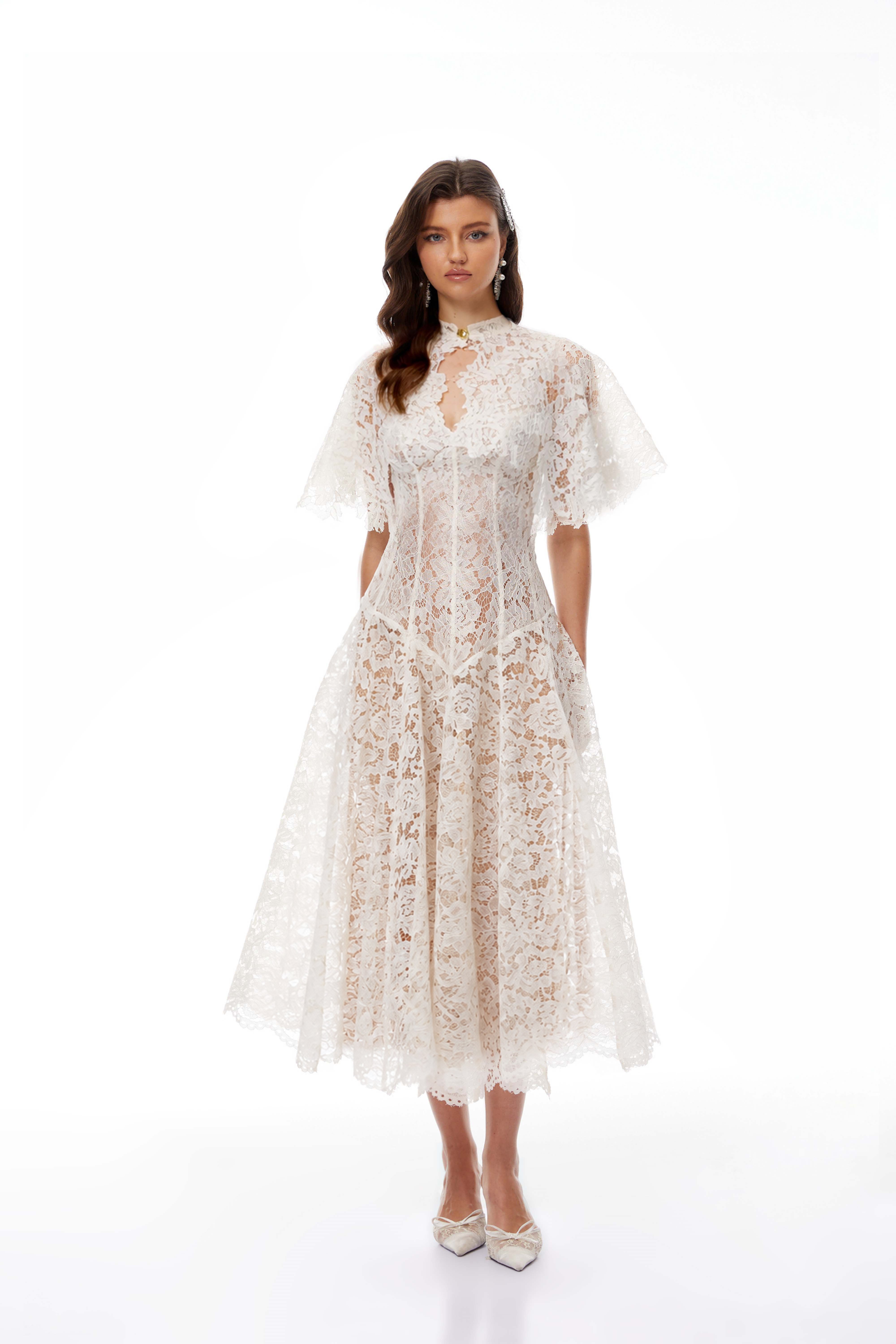 White lace midi dress with a keyhole neckline and a flared skirt over a nude lining