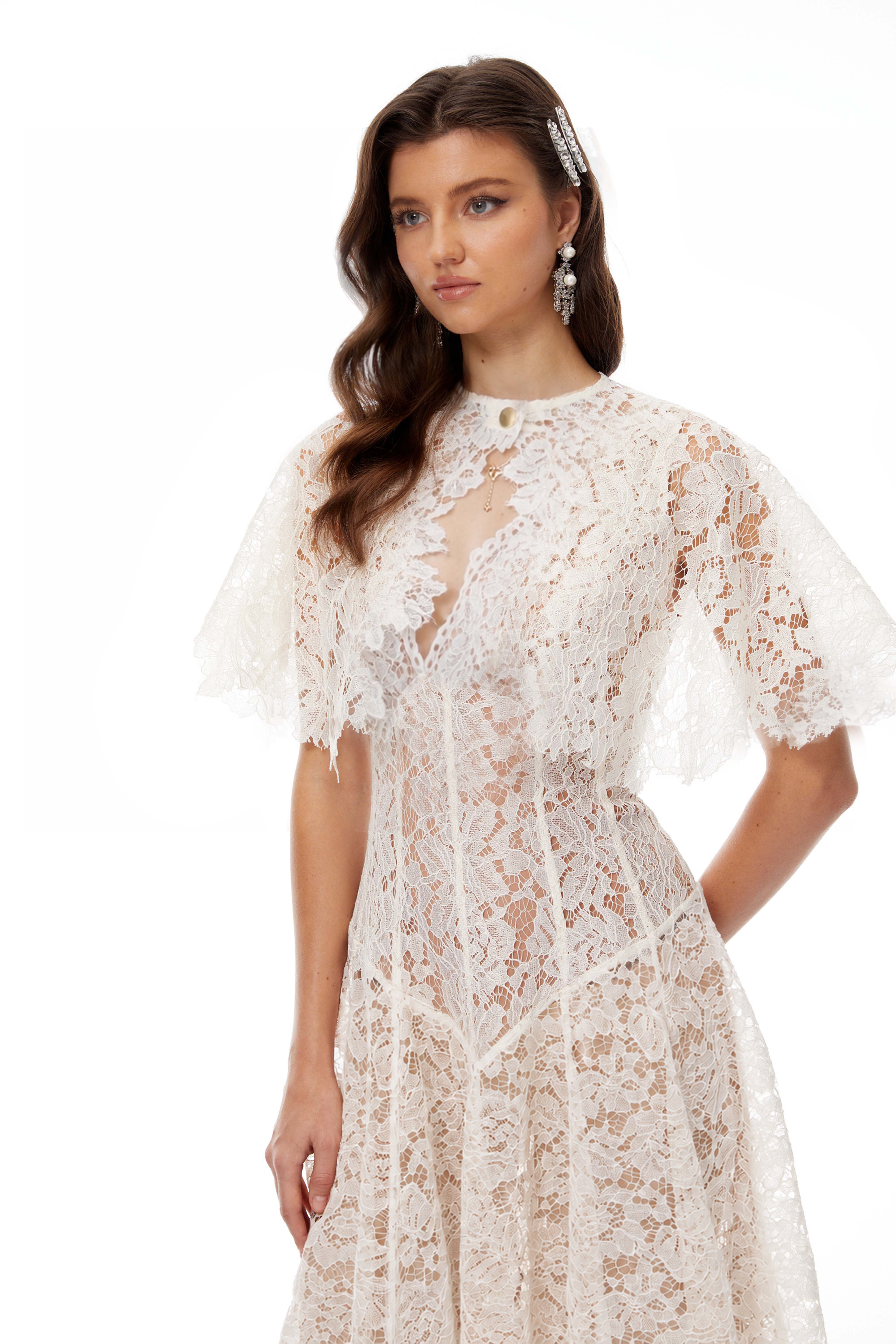 White lace midi dress with a keyhole neckline and a flared skirt over a nude lining