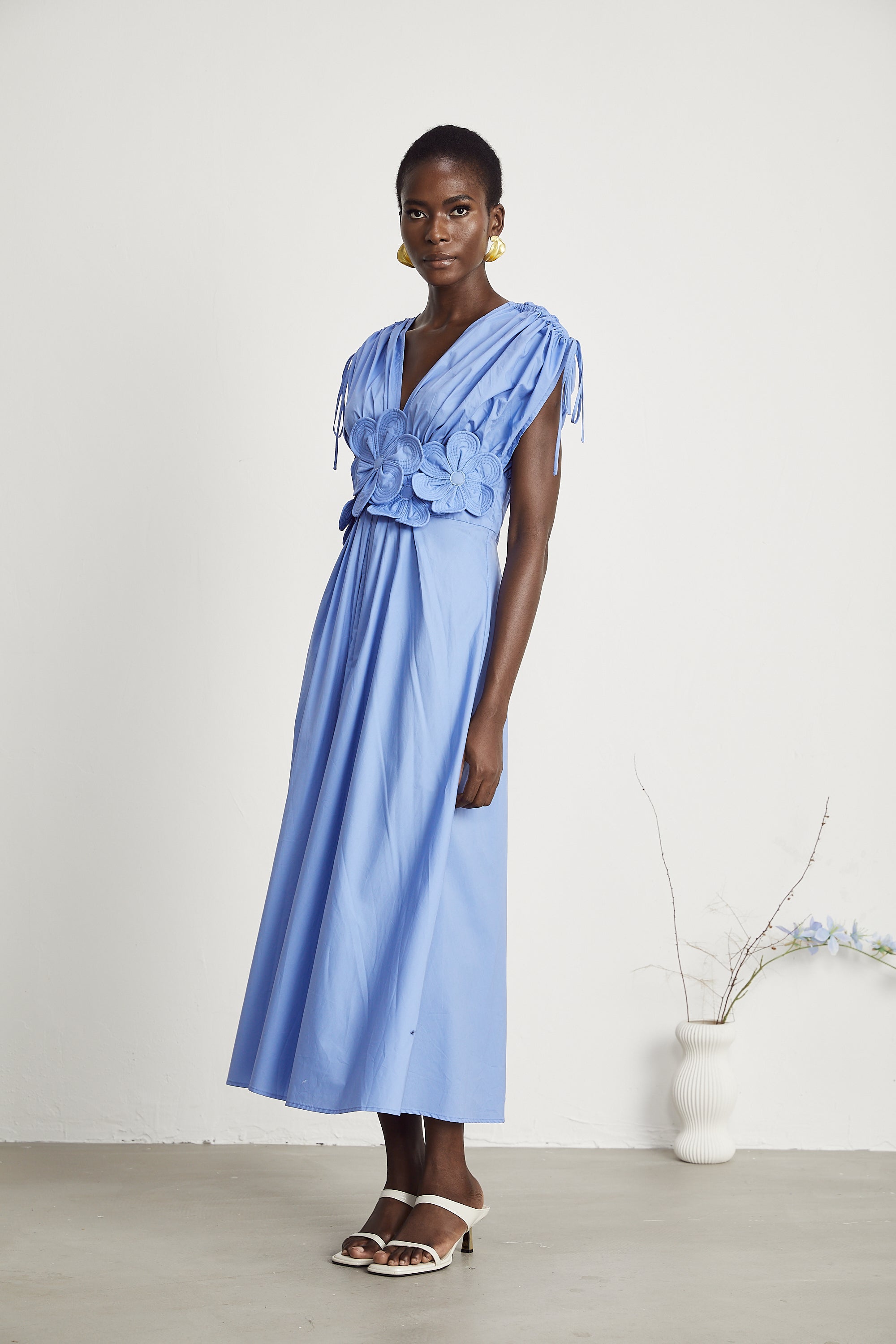 Emma petal-detail drawstring maxi dress in Blue (Final Sale)