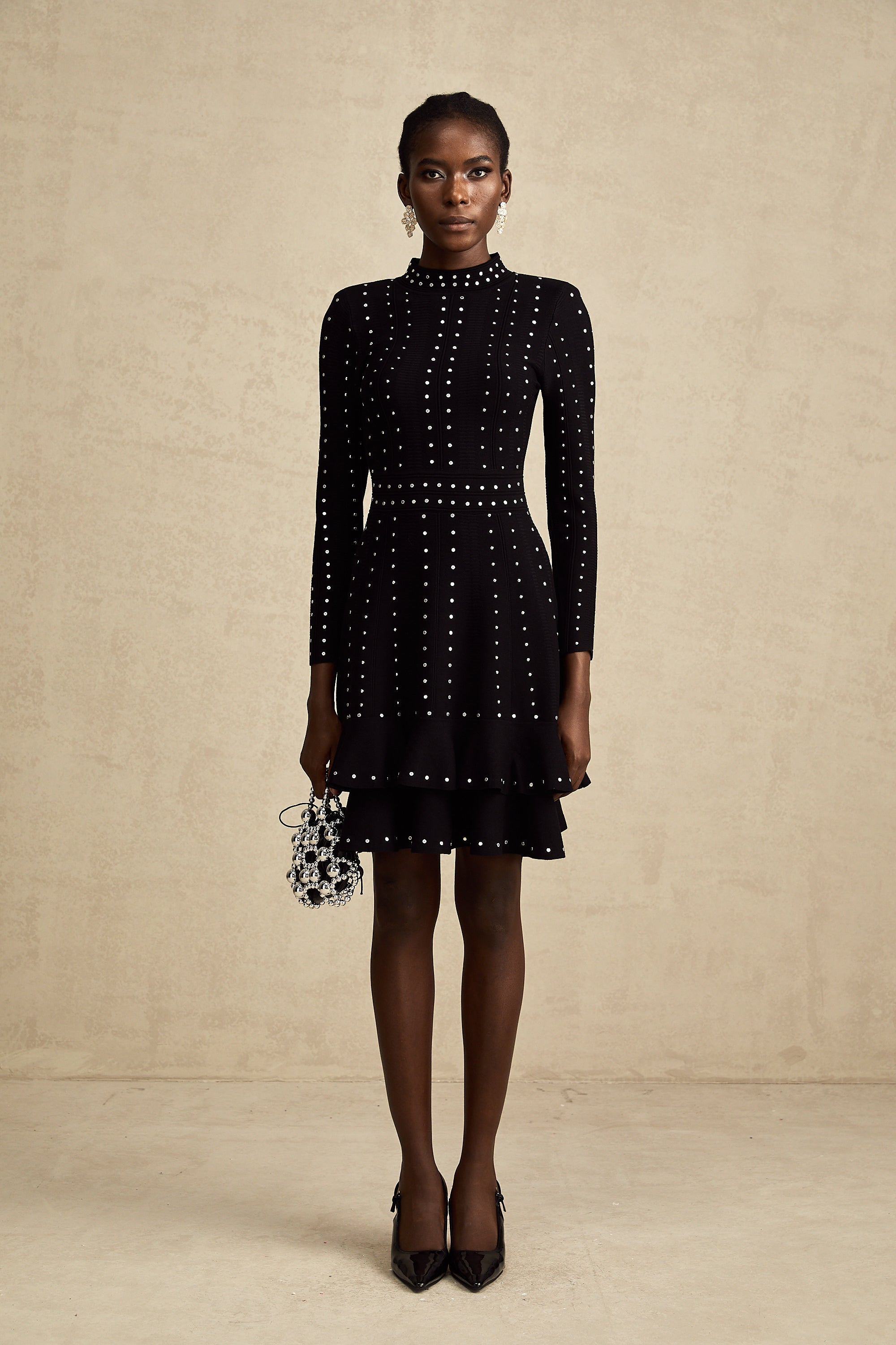 Fabienne black embellished ruffled knitted mini dress