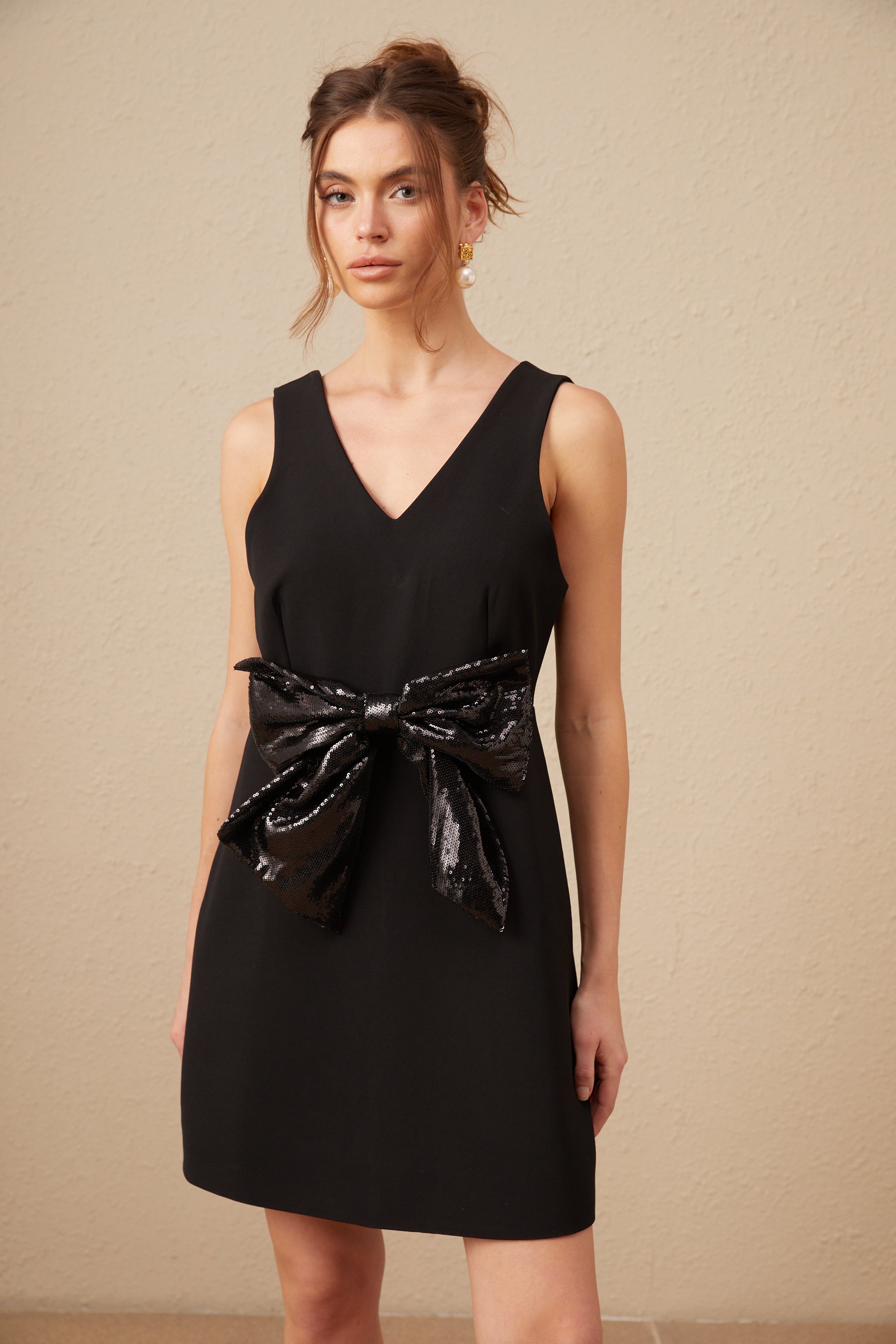 Roxane V-neck sequin-bow mini dress in Black (Final Sale-US Only)