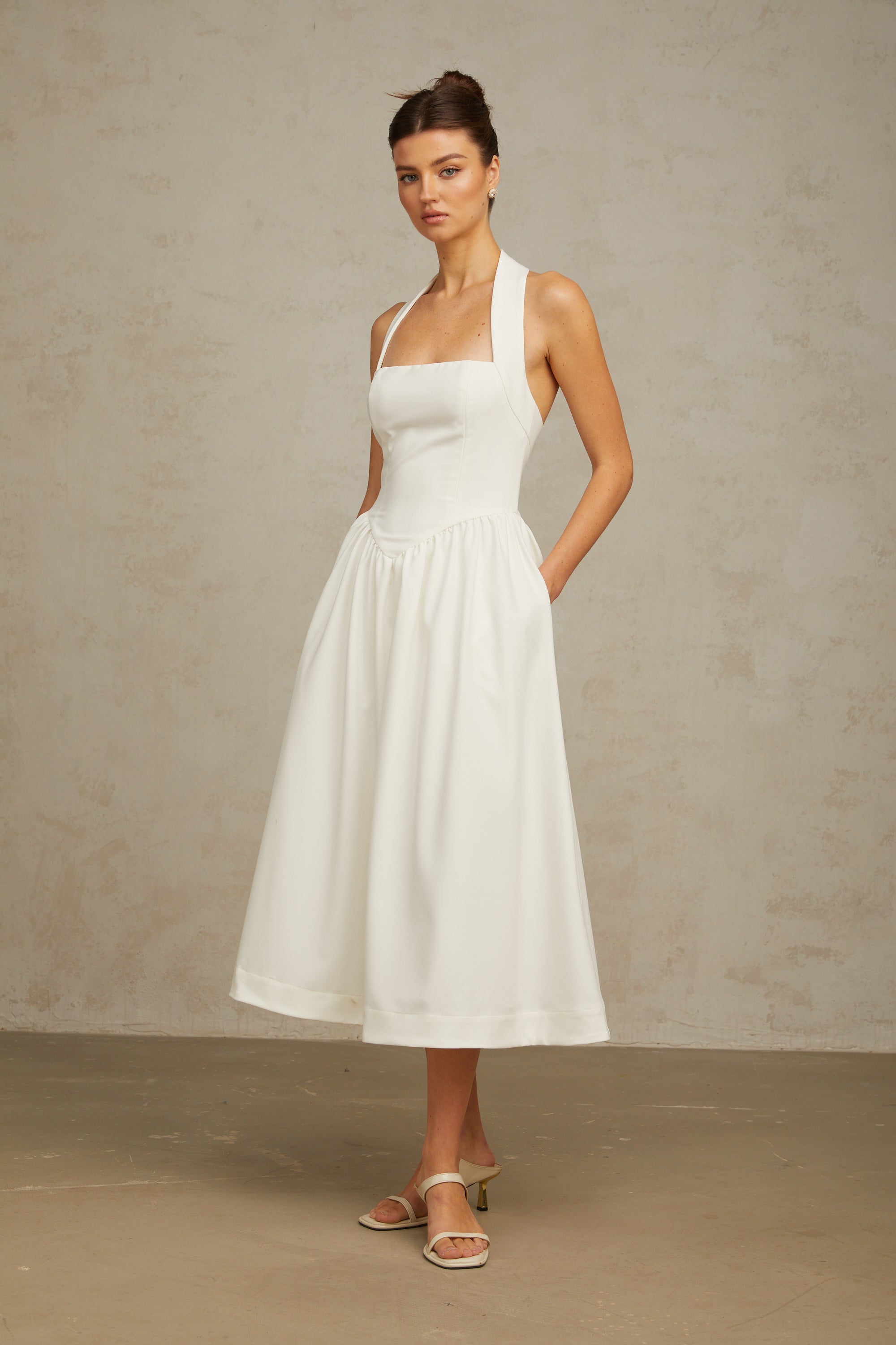 Alizée halterneck pleated midi dress in White (Final Sale)