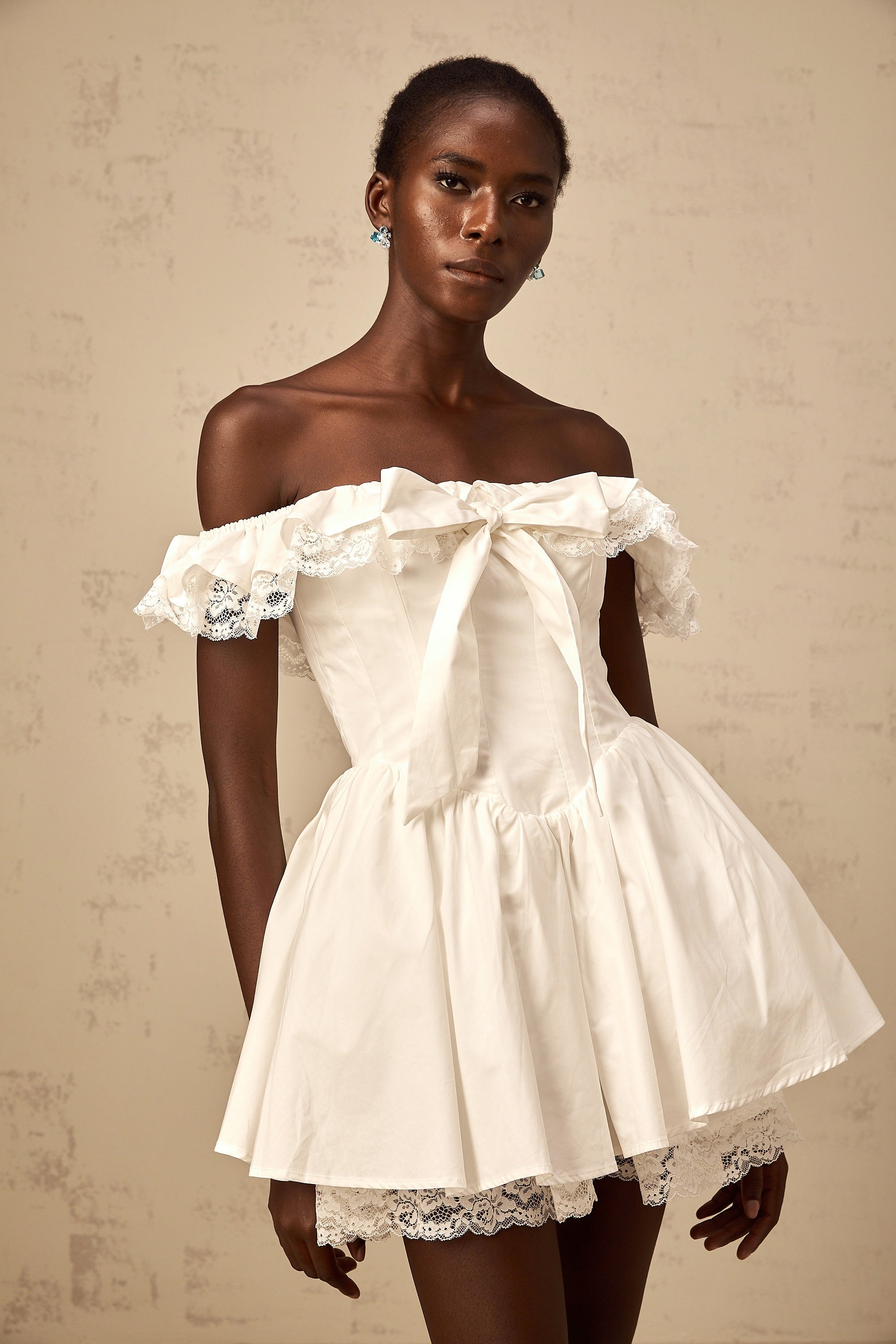 Arsène white oversize-bow ruffled mini dress (Final Sale)
