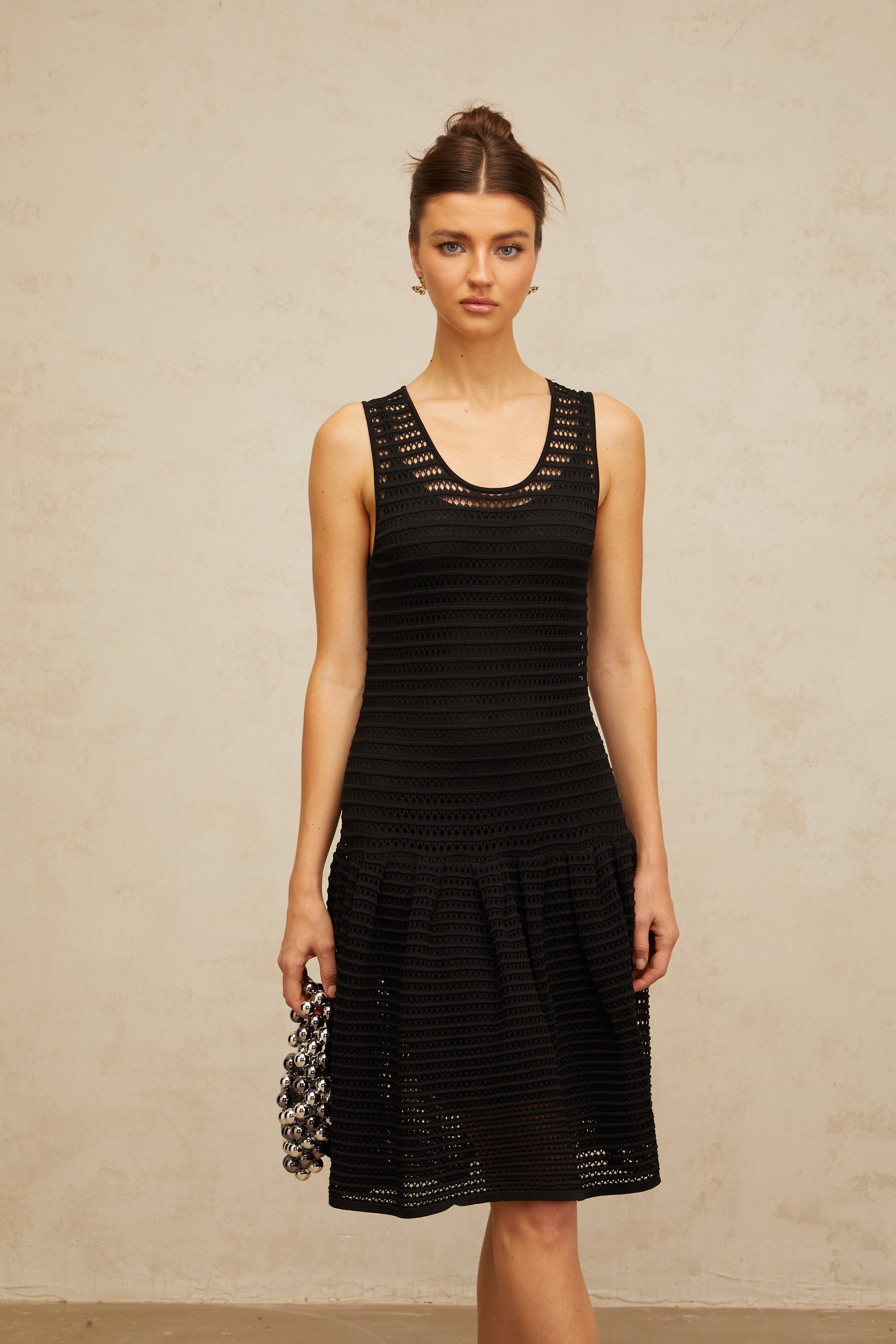 Maelle black flounced pointelle-knit mini dress