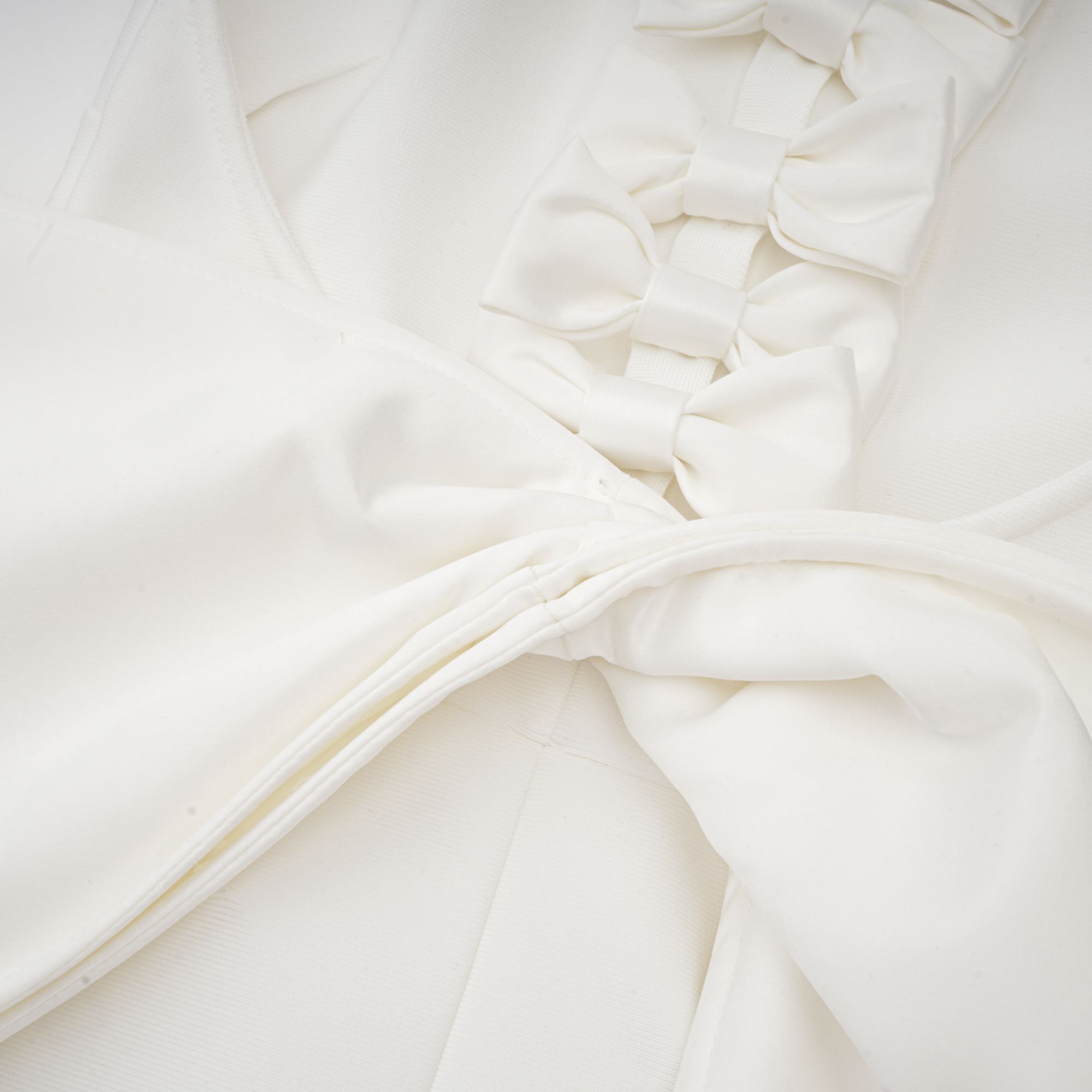 Capucine white oversize-bow bandage dress (Final Sale)