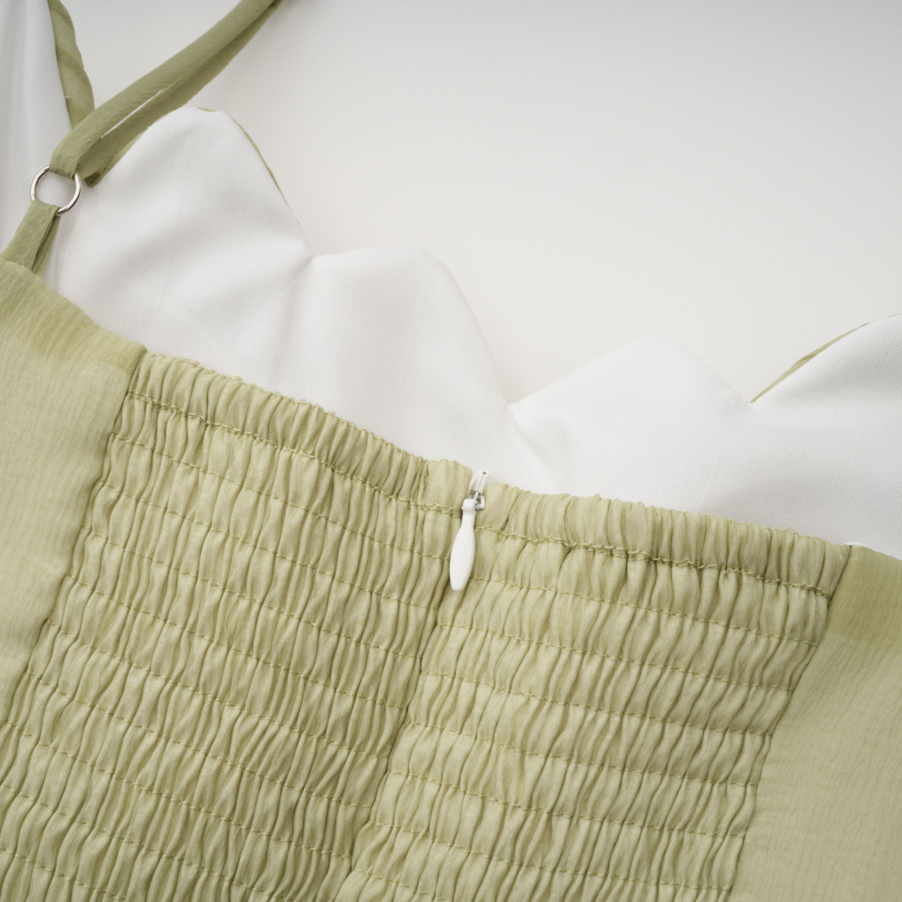 Light green spaghetti strap maxi dress with a ruffled neckline