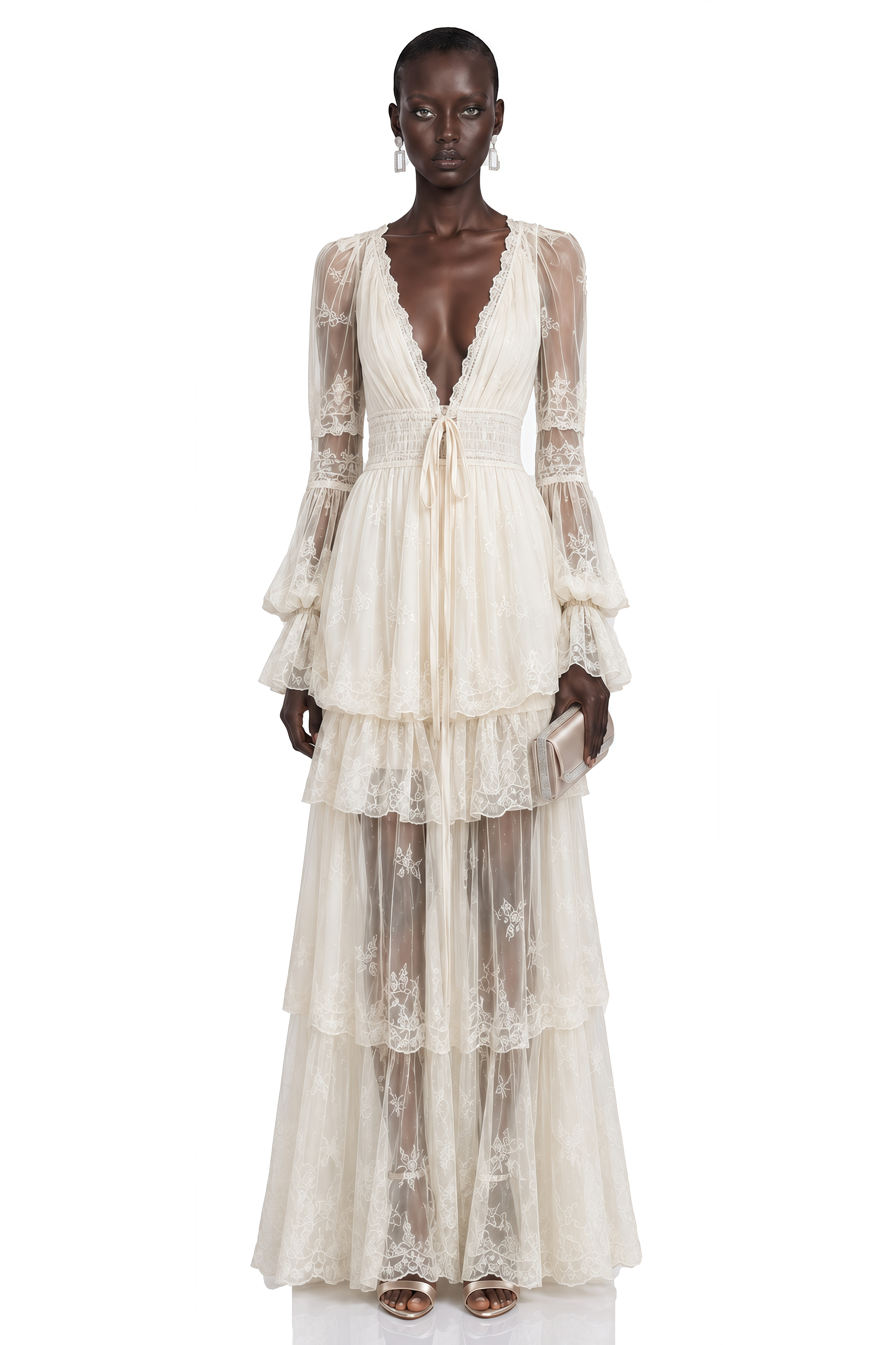Ivory lace maxi dress with a deep V-neck, long sheer sleeves, and a tiered skirt