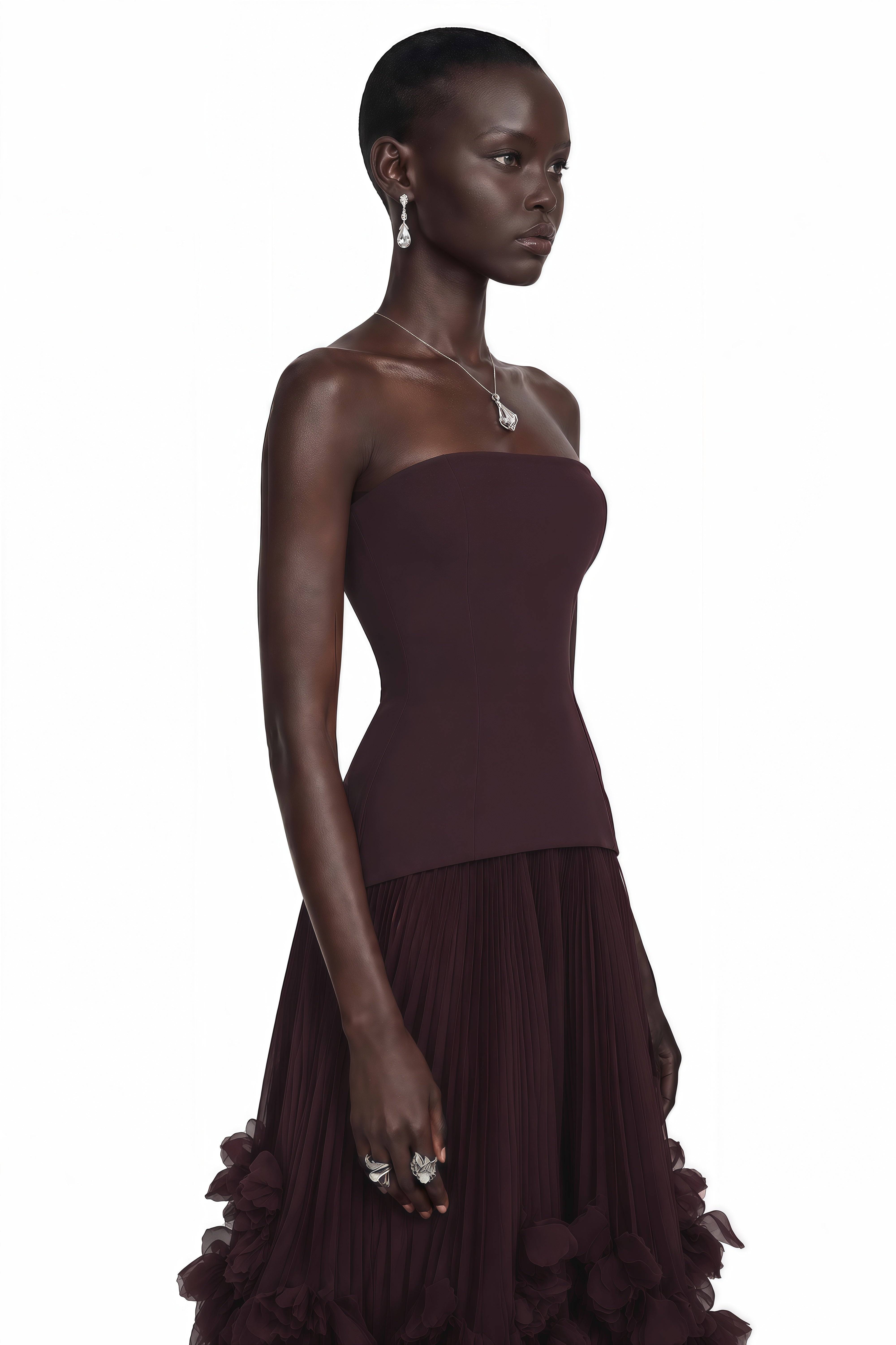 Dark plum strapless gown with a pleated tulle skirt
