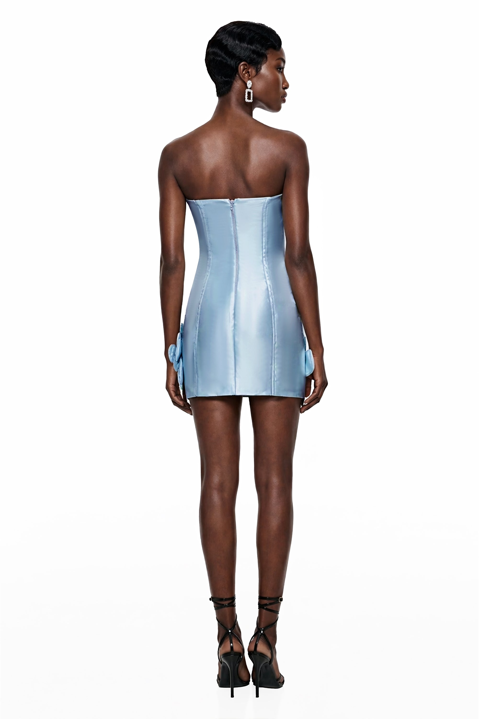 Light blue strapless mini dress featuring a structured corset bodice, detailed with embellished 3D floral appliqués