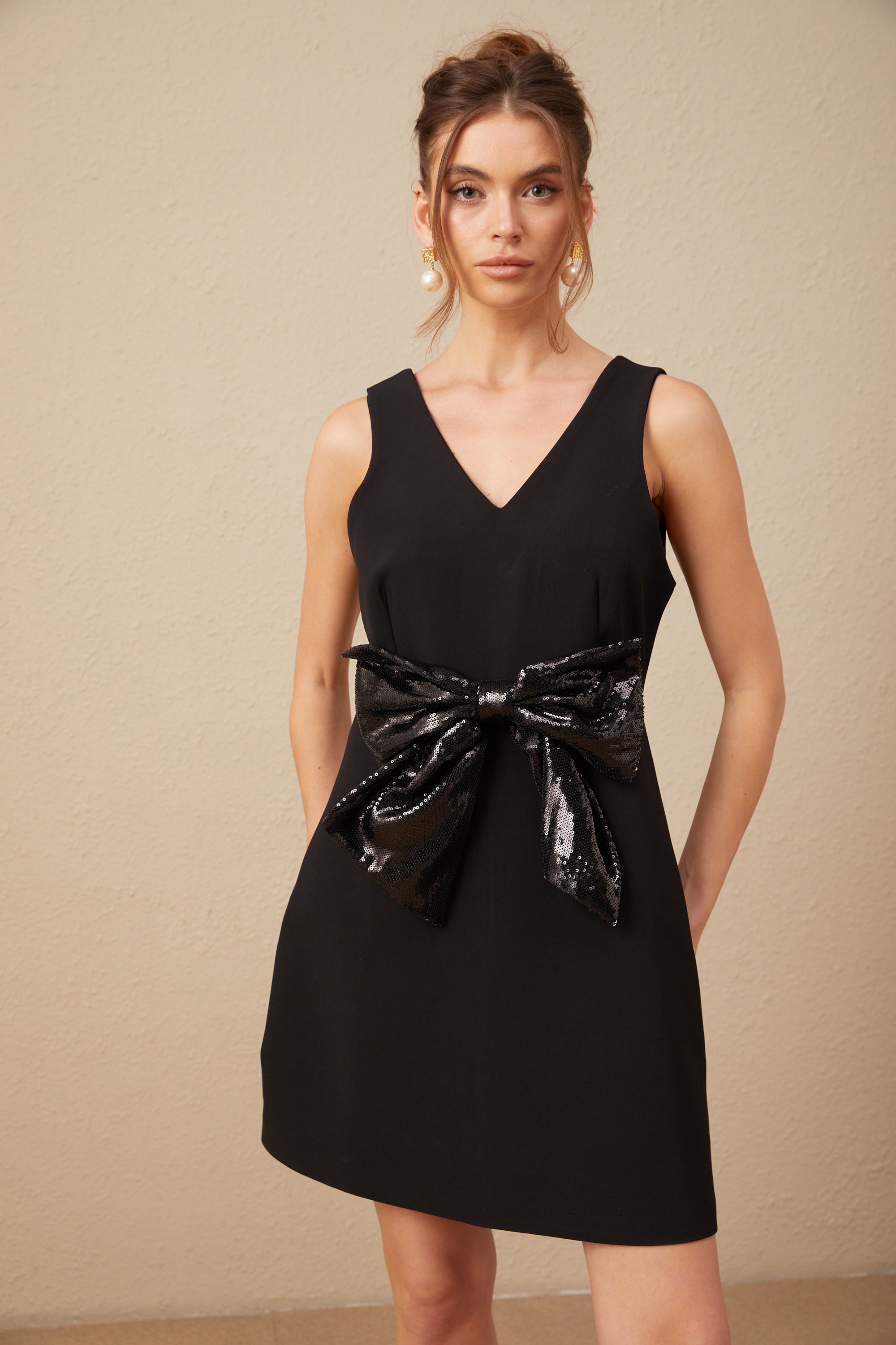 Roxane V-neck sequin-bow mini dress in Black (Final Sale-US Only)