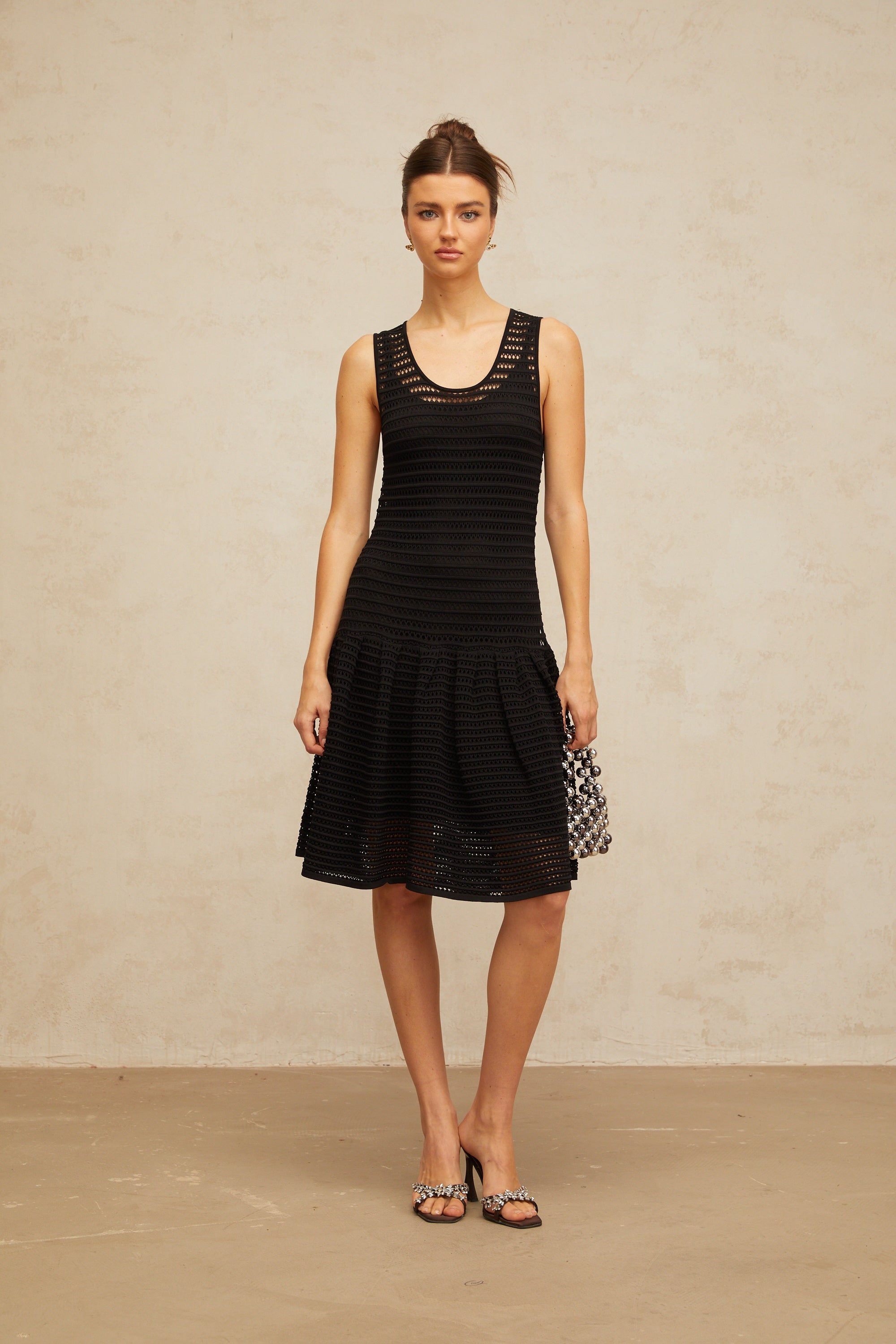 Maelle black flounced pointelle-knit mini dress