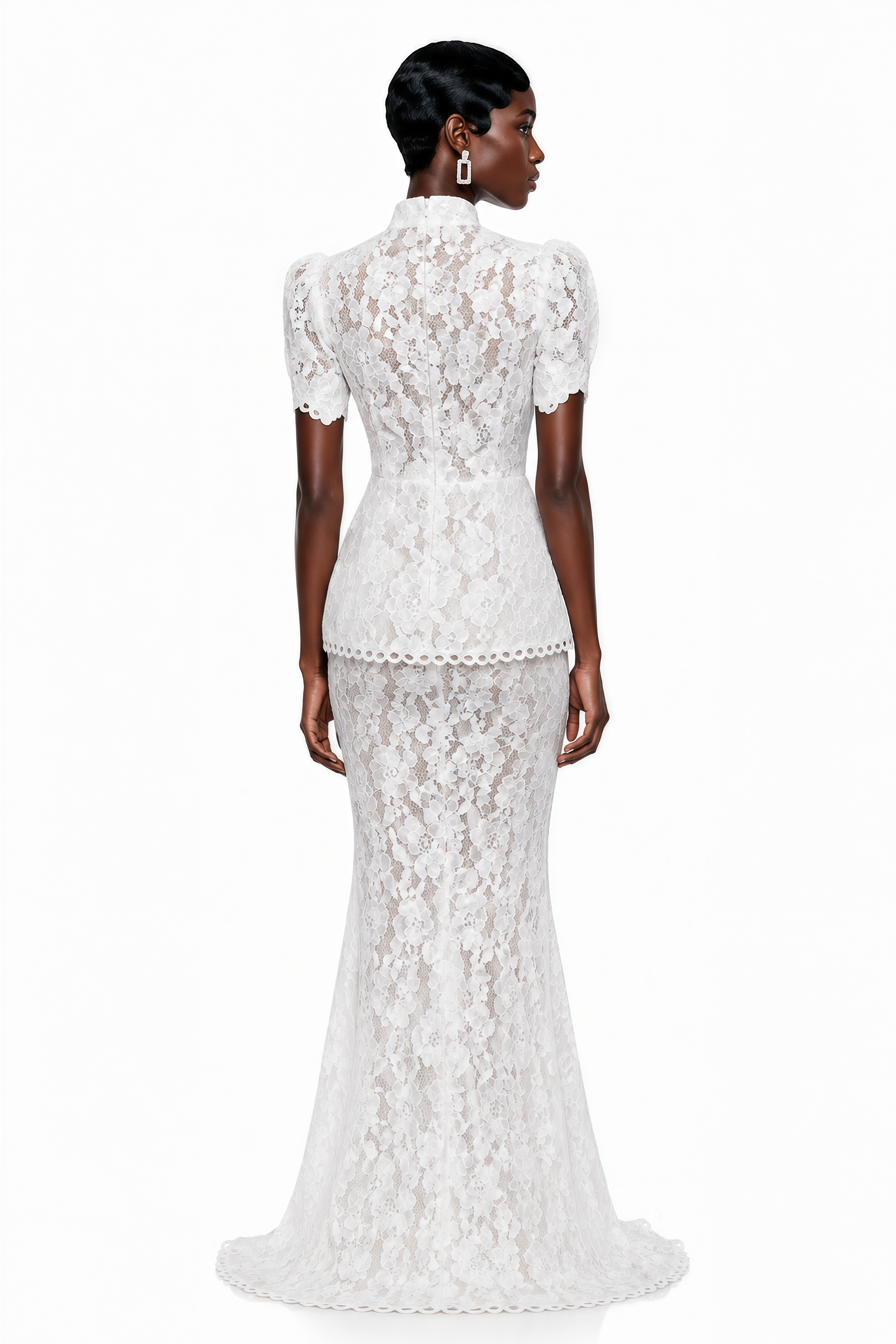 White floral lace maxi dress featuring a high neck, button-up bodice, short puff sleeves, and a peplum waist
