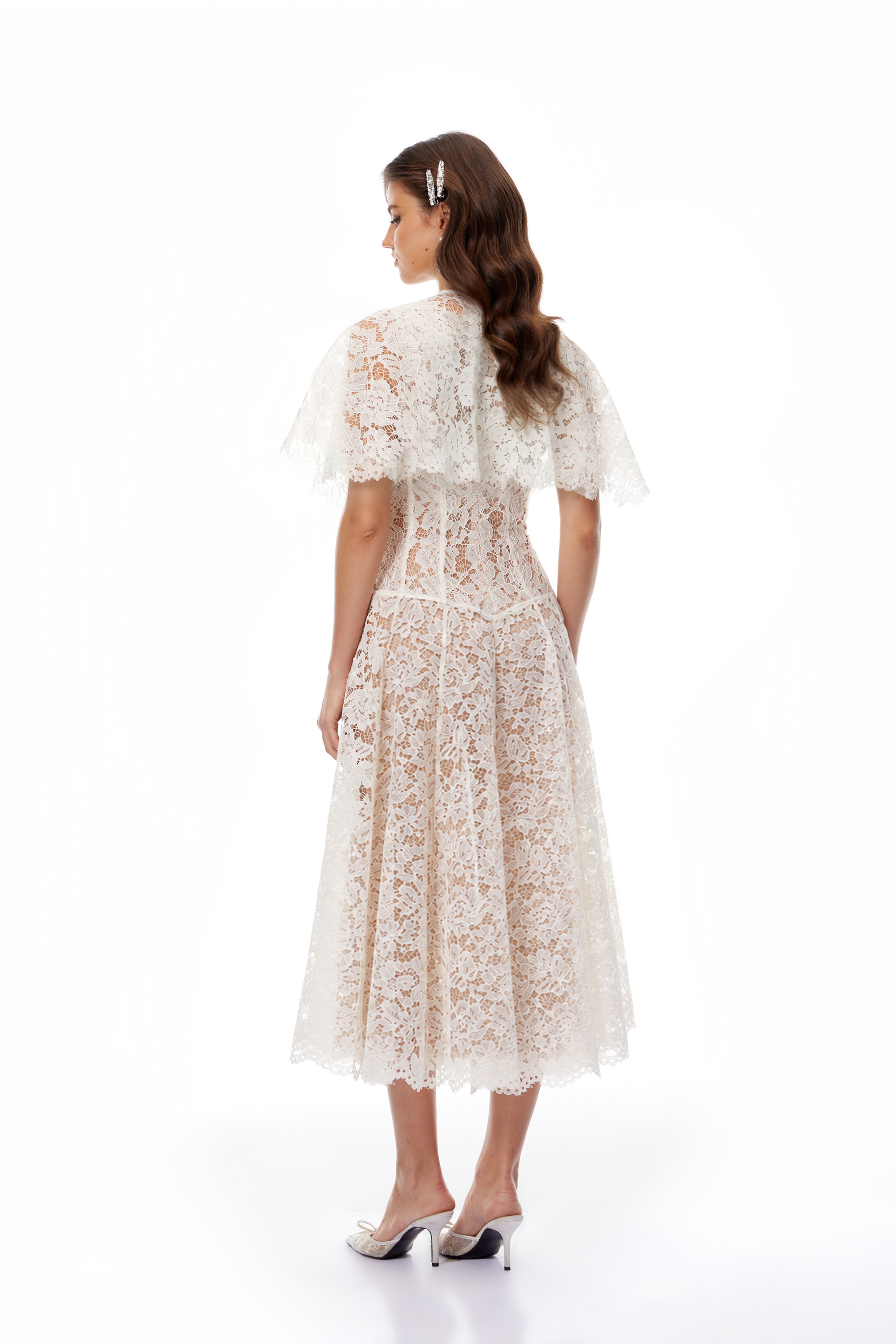 White lace midi dress with a keyhole neckline and a flared skirt over a nude lining