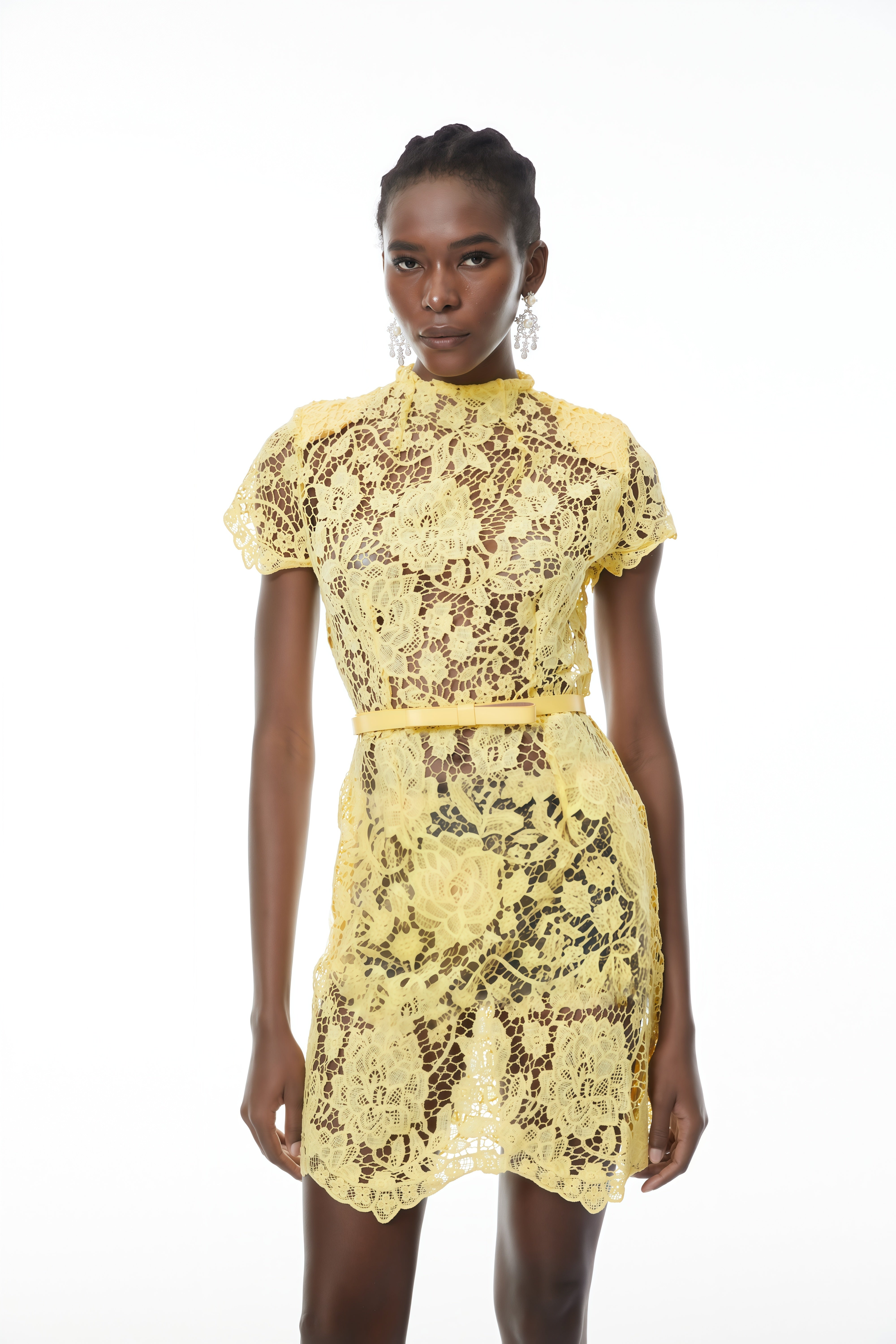 Yellow sheer mock-neck short-sleeve lace mini dress with a matching belt