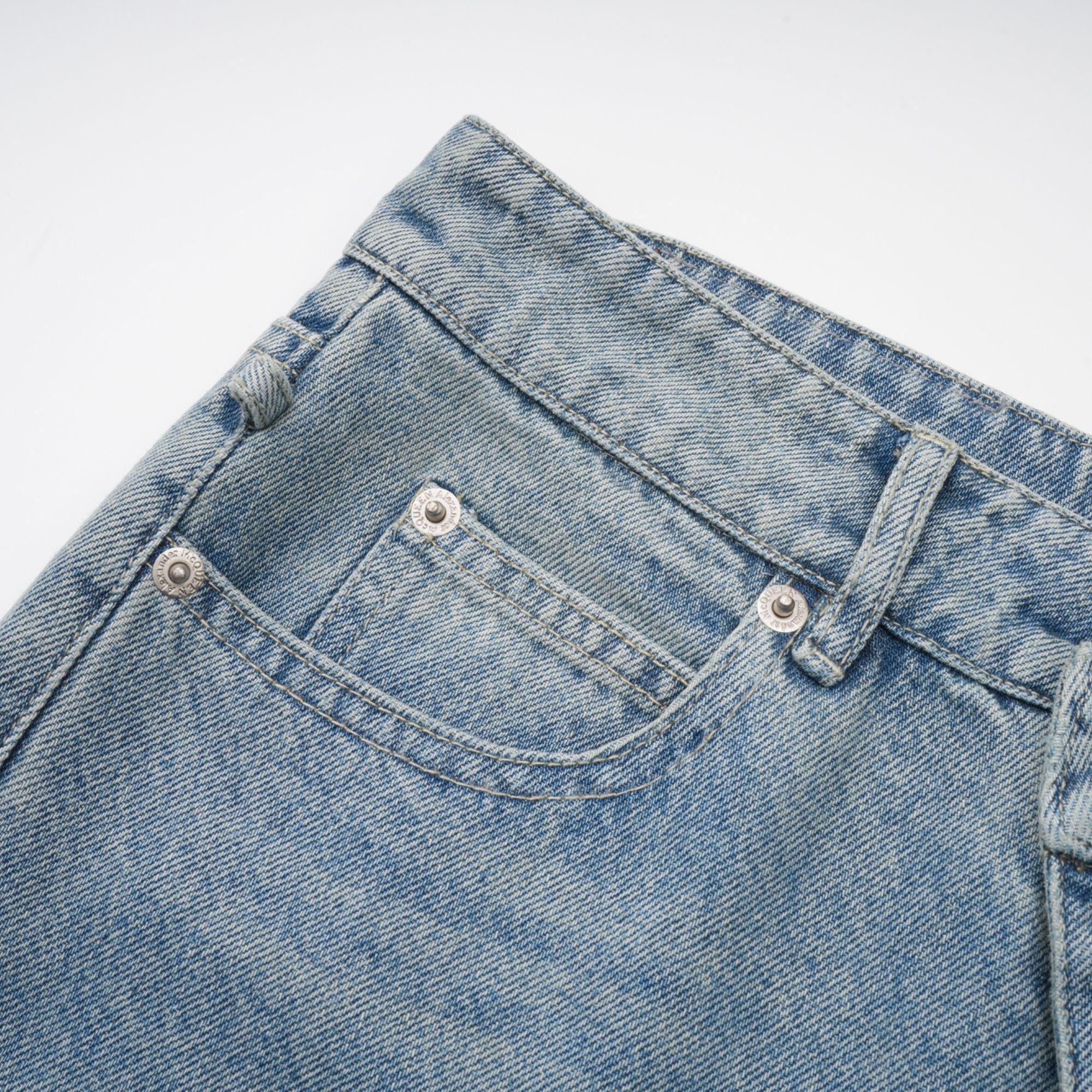 Géraldine strap-detail jeans (Final Sale)