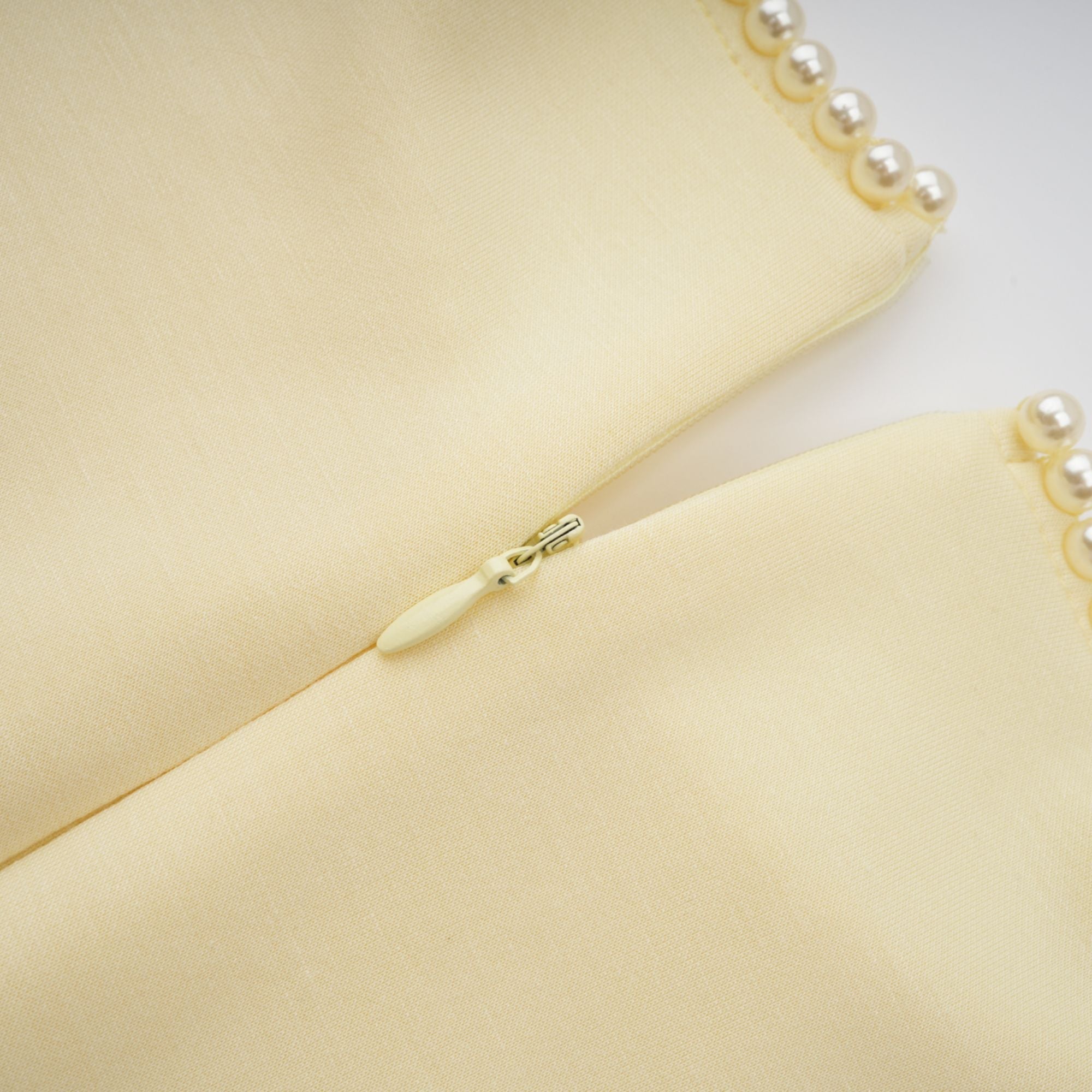 Light yellow long-sleeve maxi dress with a matching beaded cape overlay