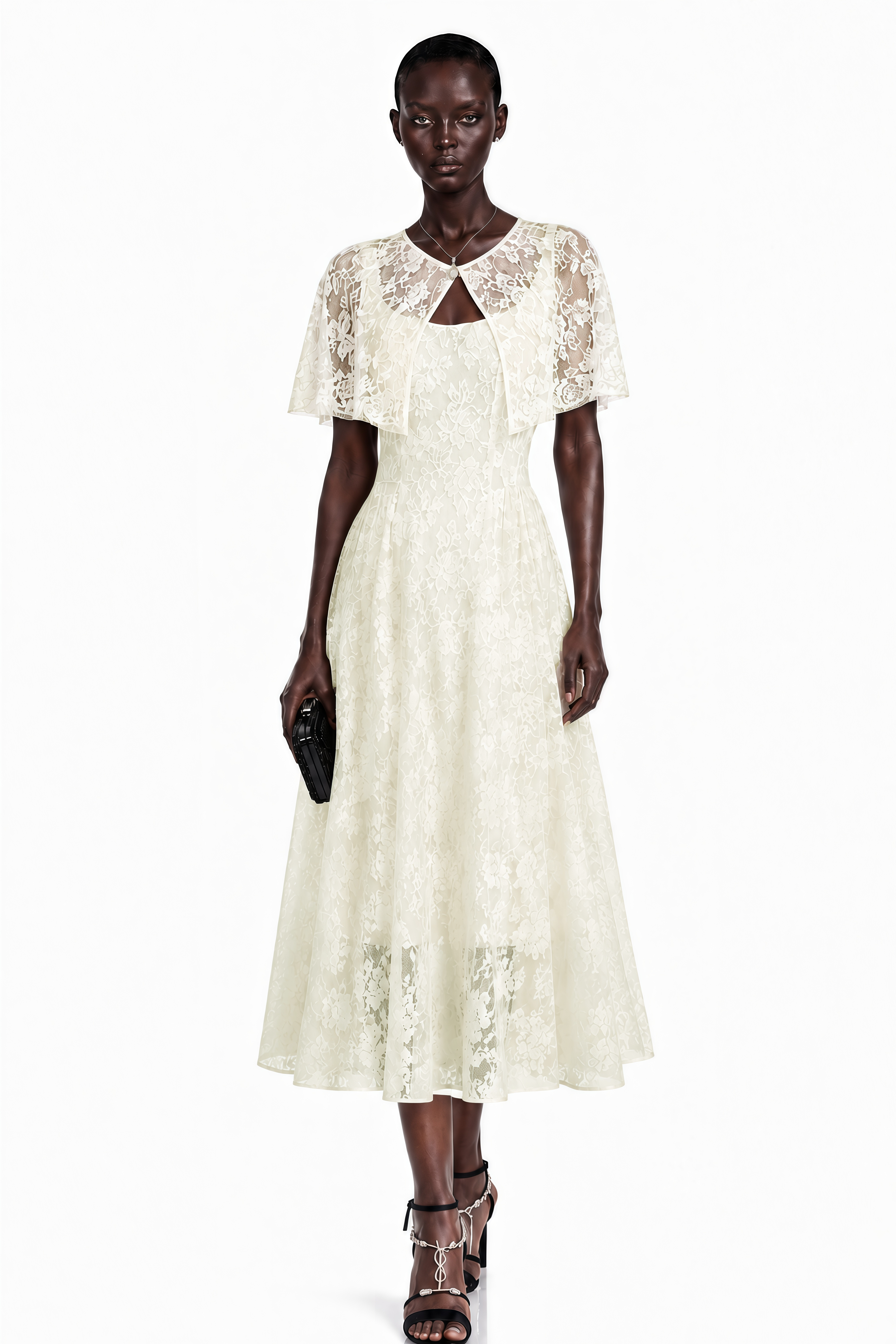 White lace midi dress with a fitted waist, cutout neckline, and short flutter cape sleeves