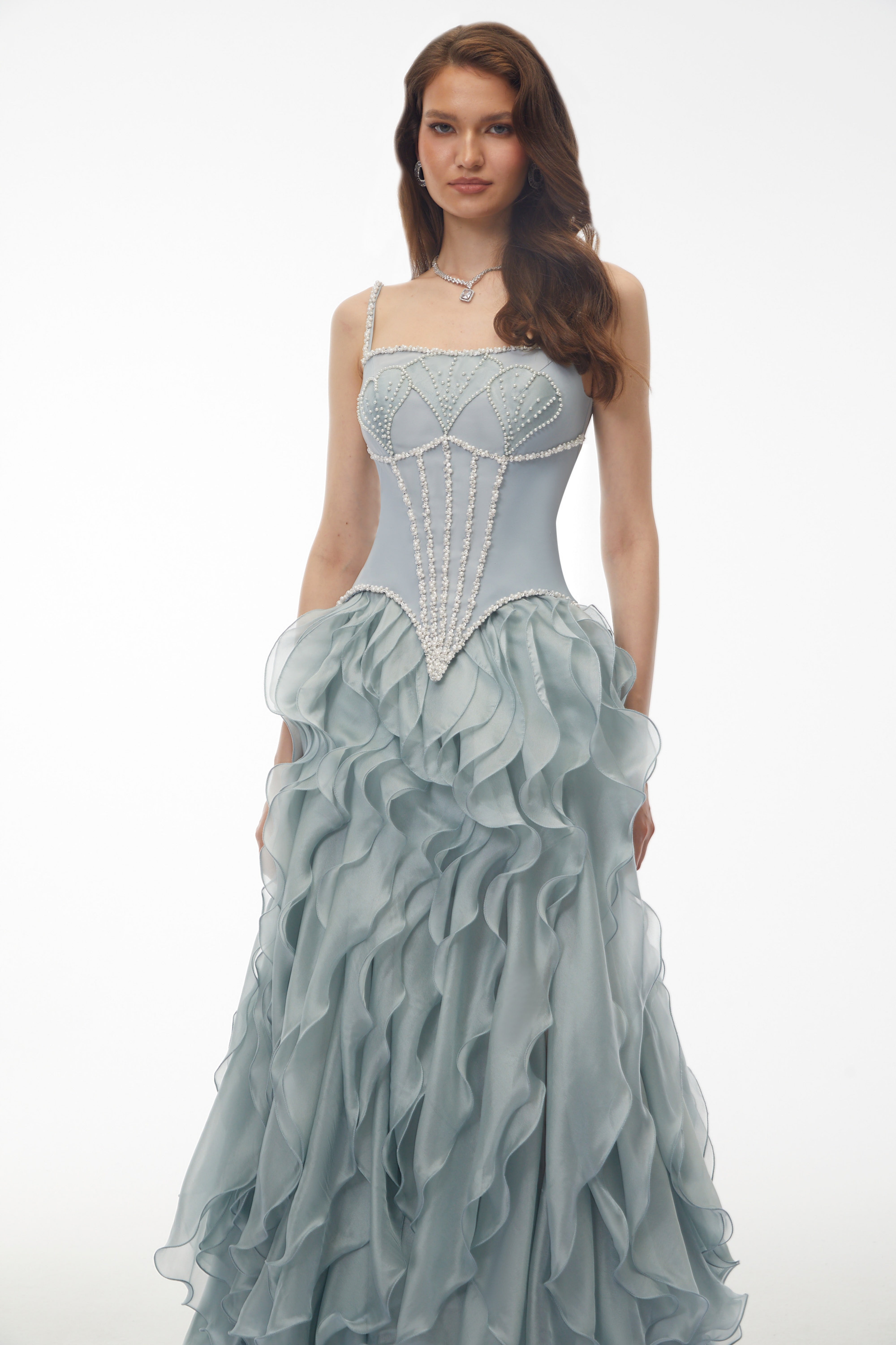 Dusty blue maxi dress with a pearl-embellished corset bodice and a tiered ruffled organza skirt