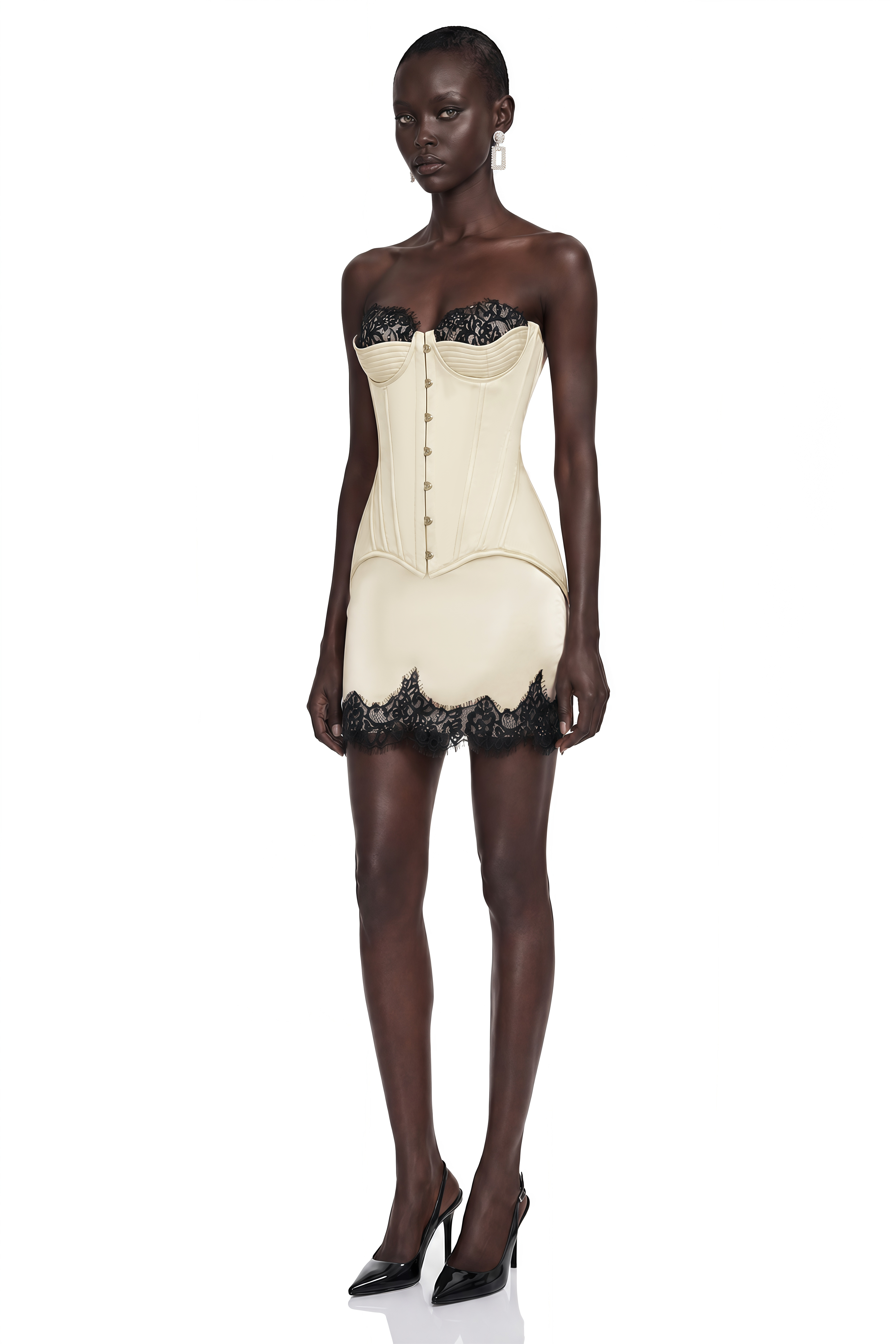 Cream strapless mini dress with a peplum corset and black lace trim