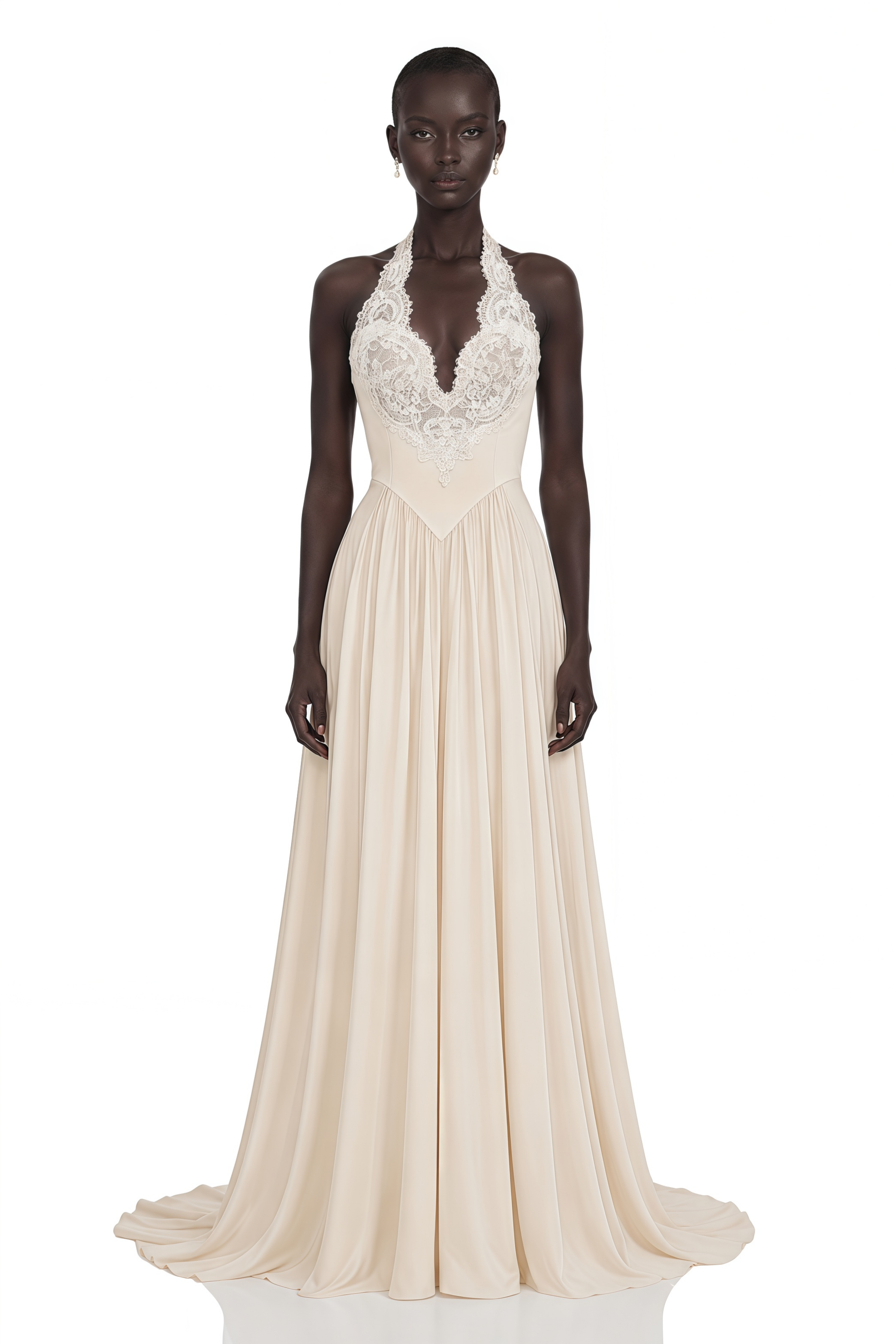 Cream halter maxi dress featuring an intricate lace bodice and a flowing pleated skirt