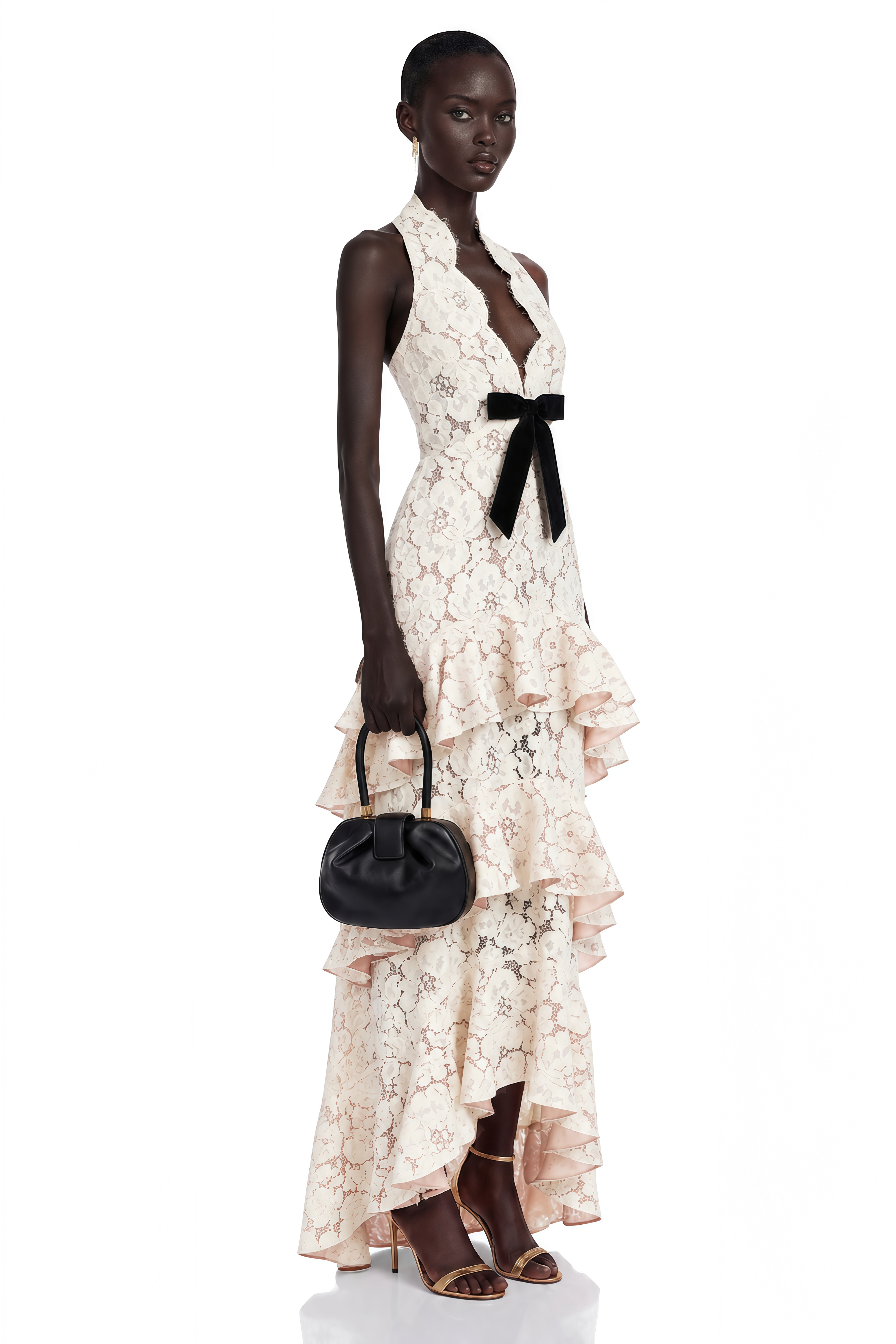 Cream lace halter maxi dress with a black bow and tiered ruffled skirt